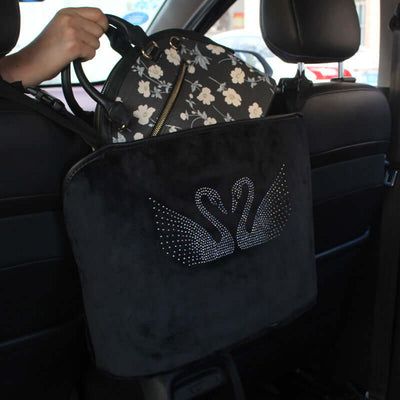 Storage net pocket between car seats B